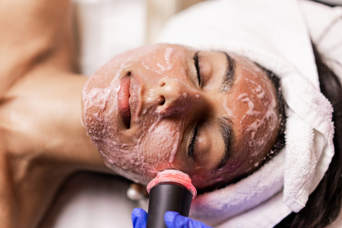 Medical facial exfoliation treatment on a client's skin during a Tampa, FL visit at Fusion Medispa